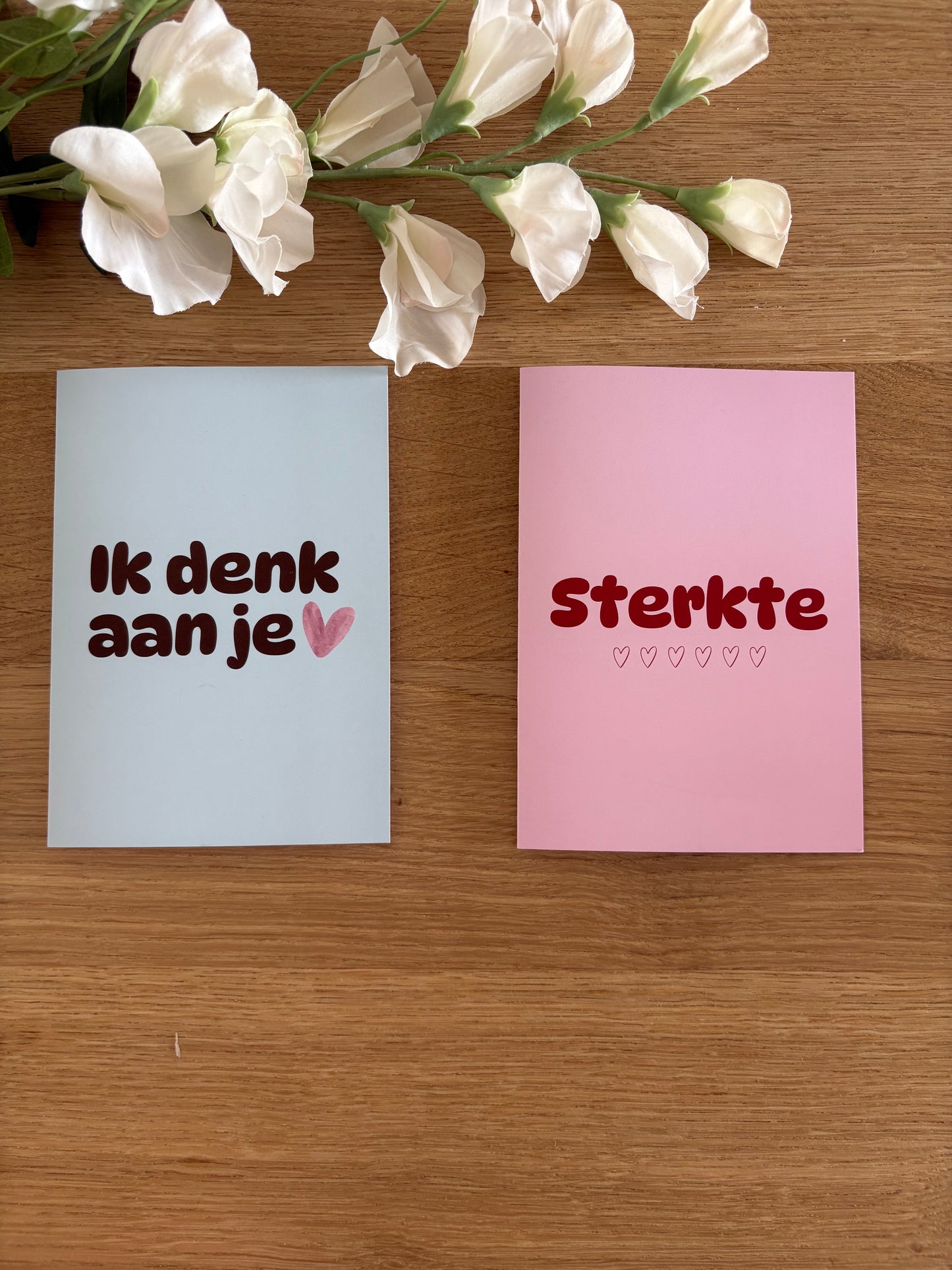 Wenskaart Sterkte met hartjes